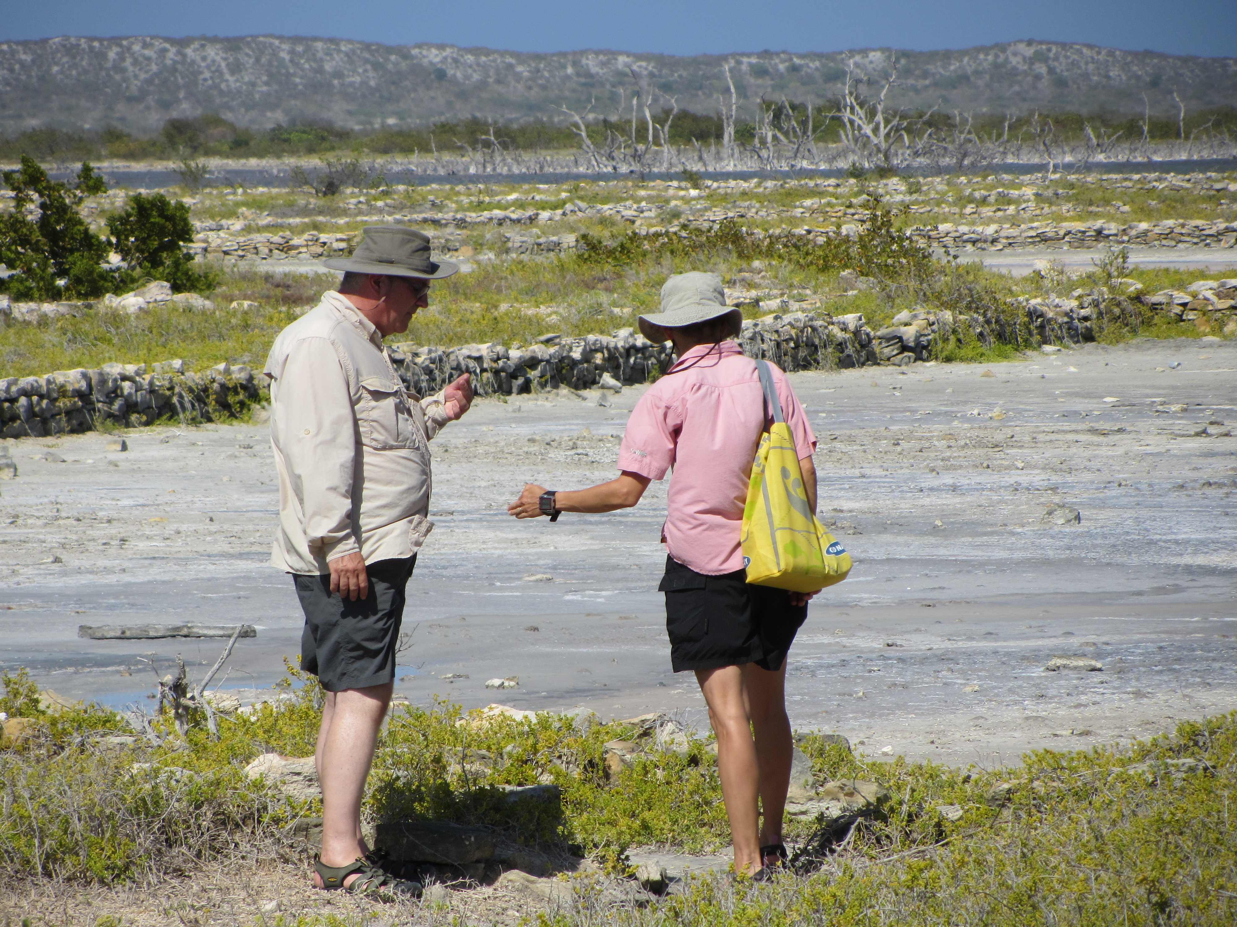 Tony and Jane collecting salt from the pond.