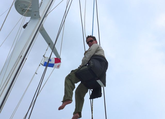 One of the things high on Eric's to-do list was to climb the mast. Here he is partway up.
